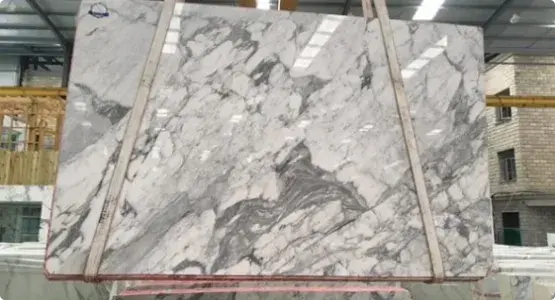 Net-reinforcement of marble slabs